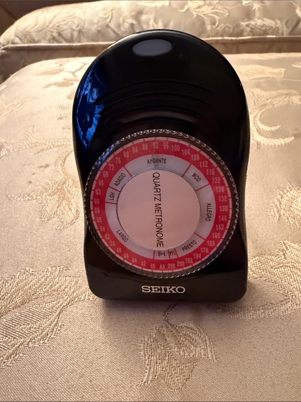 Seiko Black Metronome with Red and White Dial